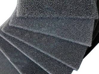 Six pieces of activated carbon foam with different pore size on the white background.